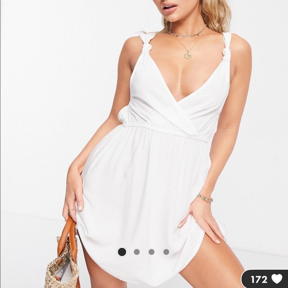 ASOS DESIGN recycled knot strap mini beach dress
in white